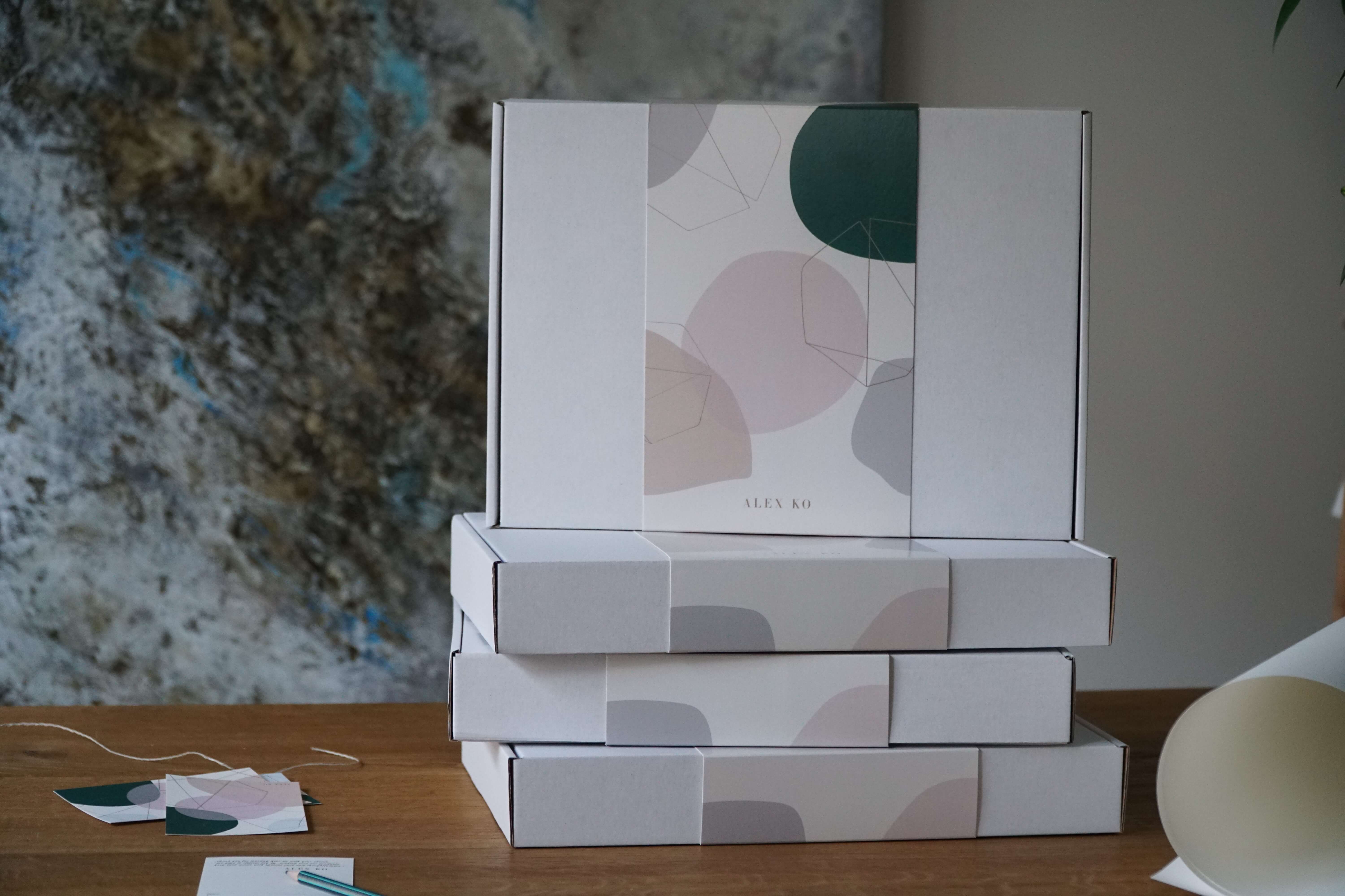 cardboard box with a sleeve by alex ko fashion brand