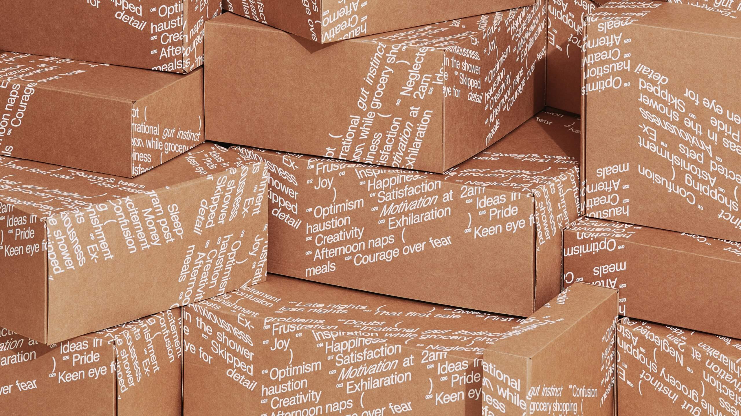 multiple kraft boxes with white ink