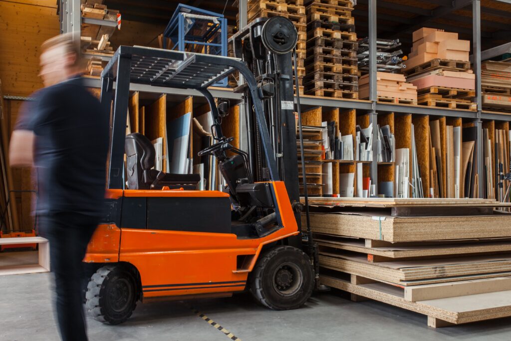 warehouse with shelves and forklift truck