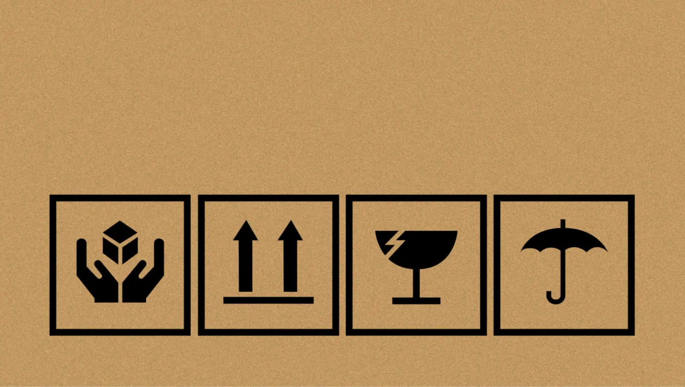 Packaging symbols printed in black ink on kraft